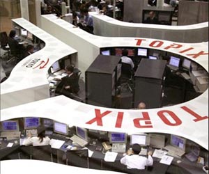 Japan Inc net profit tumbles in after quake: poll