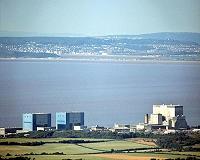 France says nuclear plant overruns 'unacceptable'