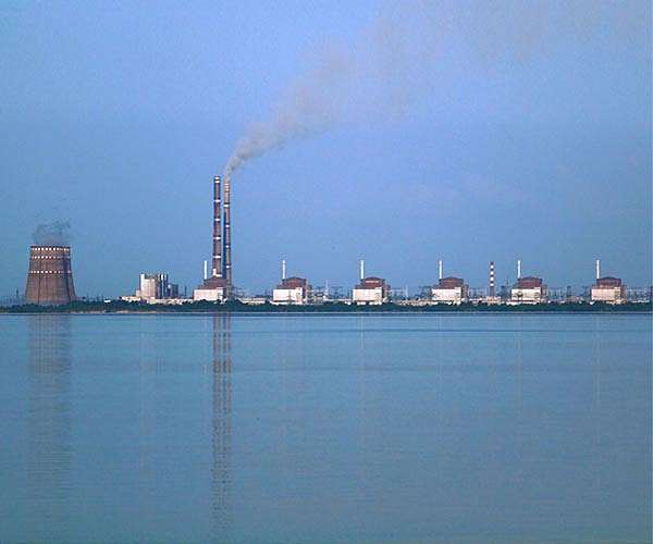 Kyiv accuses Russia of shelling town by nuclear plant as IAEA team en route