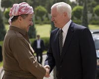 Gates hints at faster Iraqi pullout if leaders curb feuds