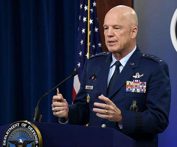 Raymond talks economy, security, leadership at Naval Academy