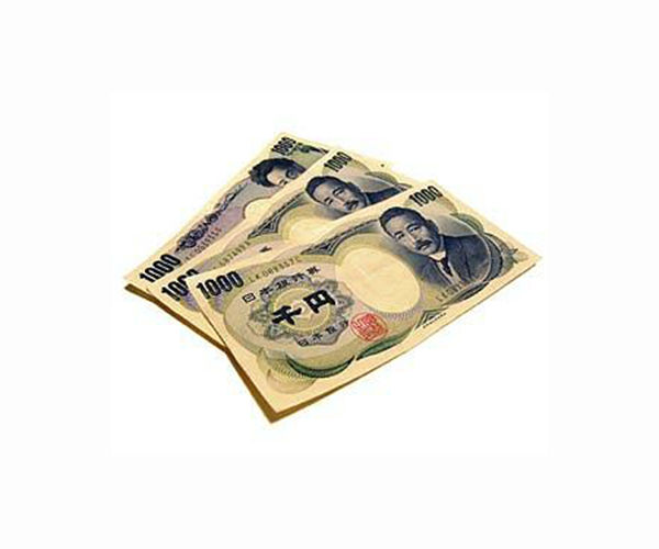 Bank of Japan revises down GDP forecast, details green fund