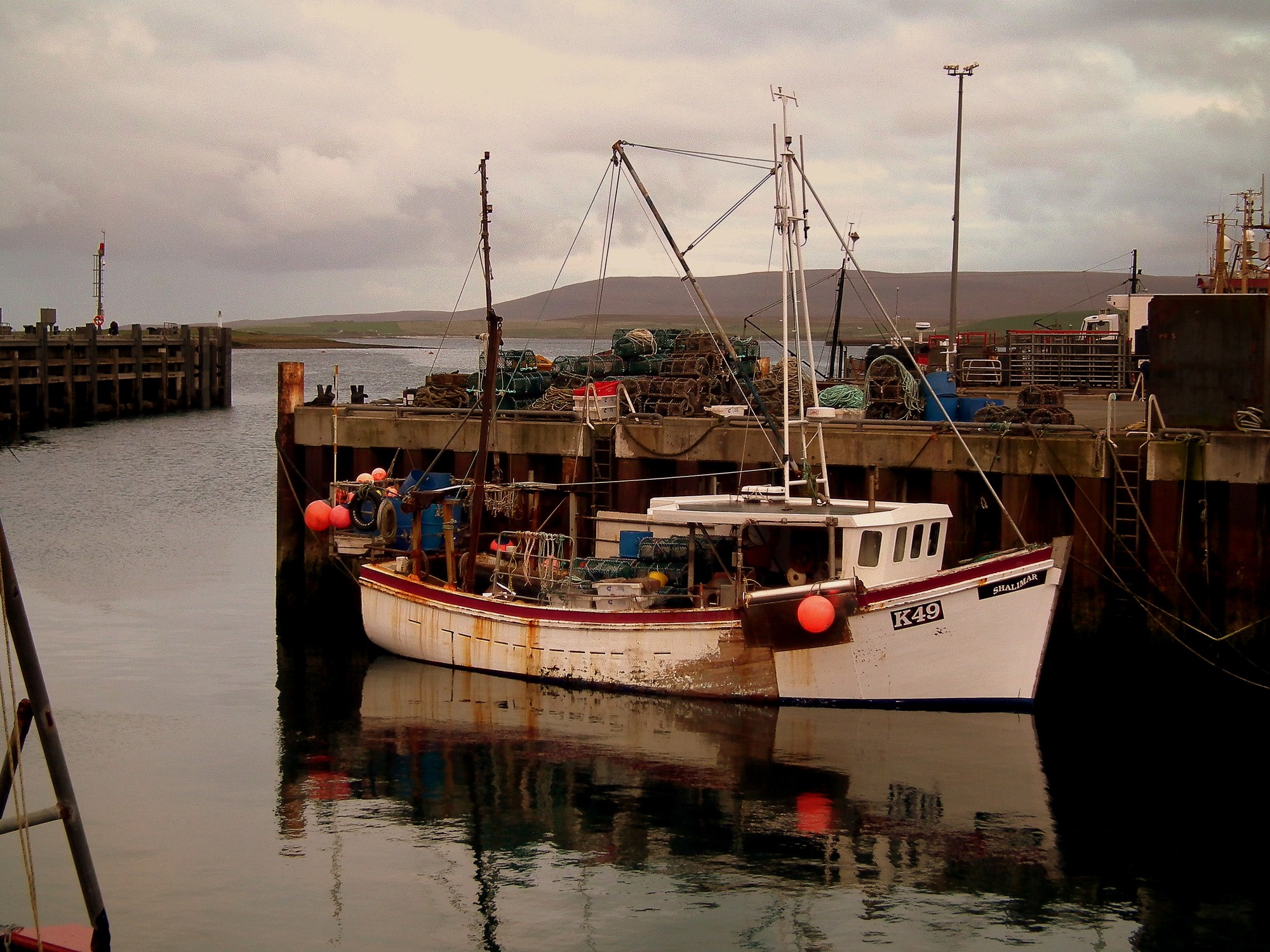 In spring 2018 Microsoft's Project Natick sank 864 servers 117 feet off Orkney; after two years underwater the sealed racks failed at one-eighth the rate of a land twin